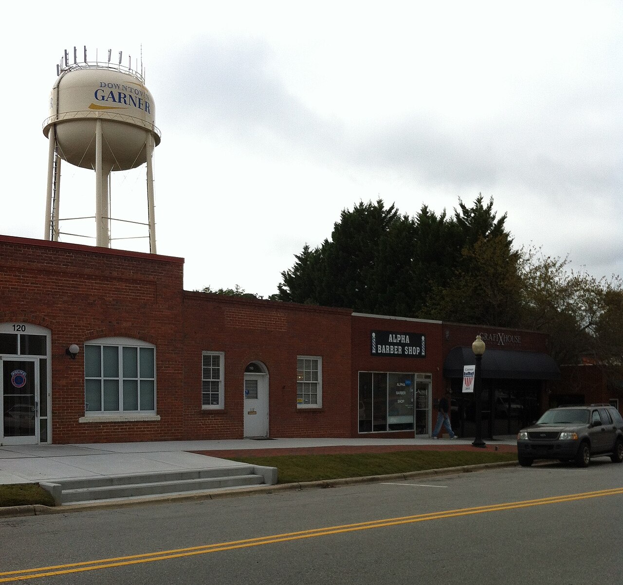Downtown Garner's water tower above historic brick storefronts
